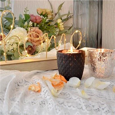 Stakleni svijećnjaci za središnje dijelove vjenčanja